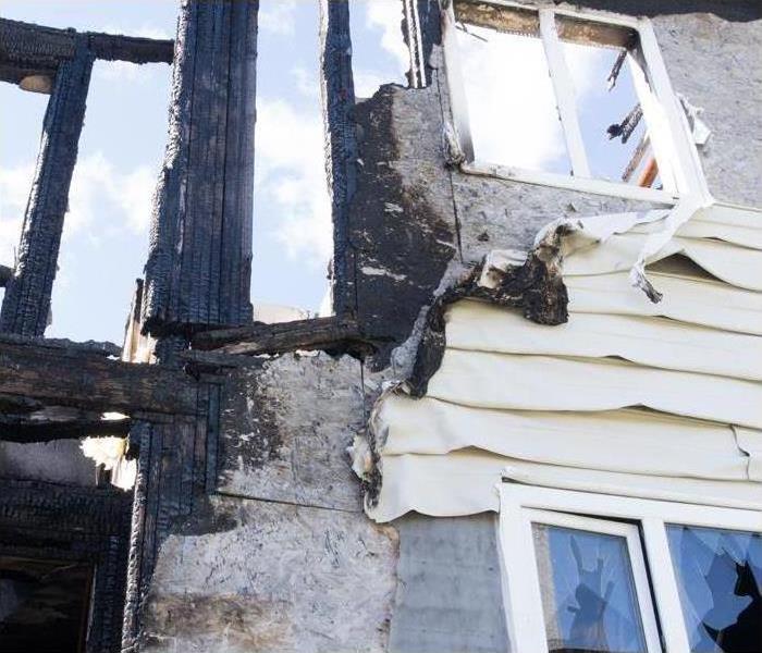 devastating structural fire damage to residential property